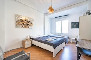 Postel nebo postele na pokoji v ubytování Jardín Botánico Rooms