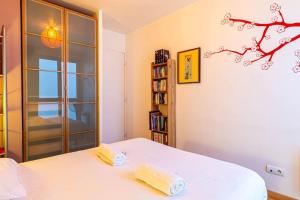 Łóżko lub łóżka w pokoju w obiekcie GuestReady - Heavenly Comfort in Montreuil