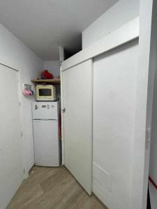 Kuchyň nebo kuchyňský kout v ubytování Monacodeluxe super equipado muy nuevo