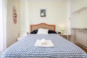 Posteľ alebo postele v izbe v ubytovaní Apartamento Ruzafa Centro II