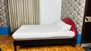 Uma cama ou camas num quarto em Star Residence
