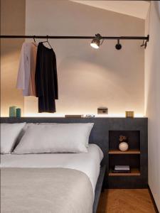 Una cama o camas en una habitación de Hotel Antica Fonte