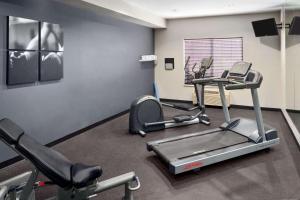 a gym with two exercise bikes in a room at Country Inn & Suites by Radisson, Manteno, IL in Manteno