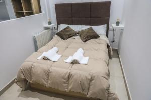 Posteľ alebo postele v izbe v ubytovaní Apartamentos Sudestada