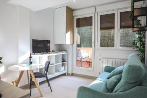 Posedenie v ubytovaní Apartamentos Sudestada