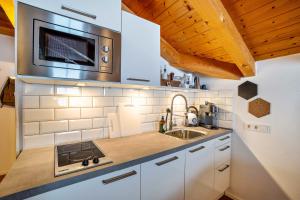 Kuchyňa alebo kuchynka v ubytovaní Mountain Residence Kasern Nr 5 + 12 fotografií