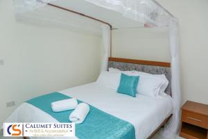 Postel nebo postele na pokoji v ubytování Calumet Suites airbnb and accommodation