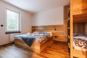 Posteľ alebo postele v izbe v ubytovaní Apartmány BARTH Holiday - Dolní Morava