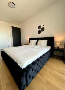 A bed or beds in a room at The View 1