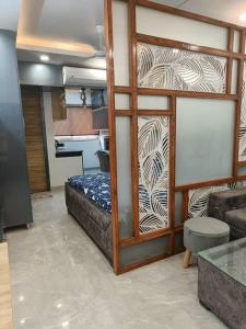 Kuchyň nebo kuchyňský kout v ubytování BnBBuddy Executive Studio Apt in West Delhi 720