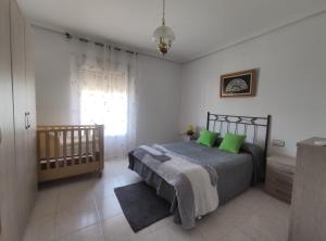 Posteľ alebo postele v izbe v ubytovaní Casa Quico