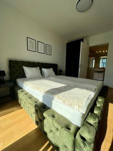 A bed or beds in a room at The View 1