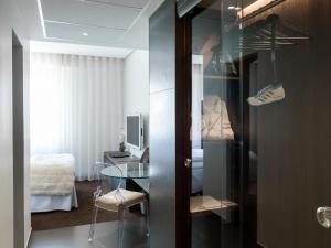 Voodi või voodid majutusasutuse Hotel Riverton toas