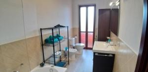 Kúpeľňa v ubytovaní Casa Rosy - Stanza privata con bagno esclusivo e parcheggio gratuito