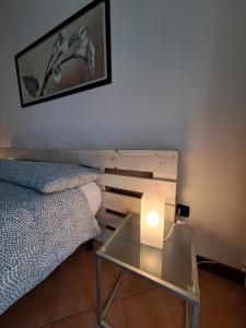 A bed or beds in a room at Casa di Gabry