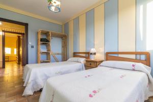 Postel nebo postele na pokoji v ubytování Casa Vistas del Valle