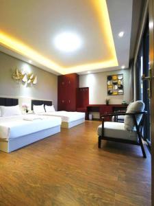 Postel nebo postele na pokoji v ubytování Peaceful ForestCity Fringe Villa 12 pax
