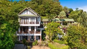 an aerial view of a house with trees at 3 Bedroom Villa Cara SDV042-By Samui Dream Villas in Mae Nam