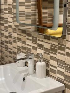 Ένα μπάνιο στο Deluxe Old Ungvar Apartments