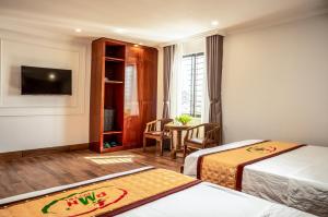 Letto o letti in una camera di Phu My Hai Hotel