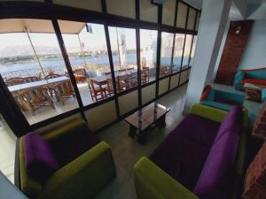 Posezení v ubytování Merry Land Hotel & Roof Top Nile Restaurant Luxor