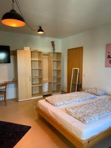 Posteľ alebo postele v izbe v ubytovaní Wolfis Appartement