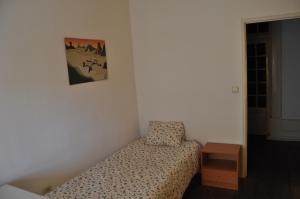 Cama ou camas em um quarto em Covilhã Hostel