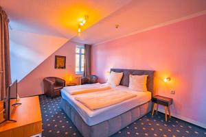Postel nebo postele na pokoji v ubytování Hotel Starke + 16 fotografií