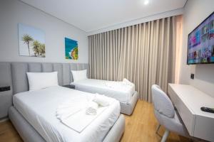Voodi või voodid majutusasutuse Hotel Sole Mare toas