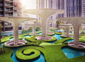 un jardin dans une ville avec de grands bâtiments dans l'établissement Arte Plus Kuala Lumpur by Inn Lux, à Kuala Lumpur