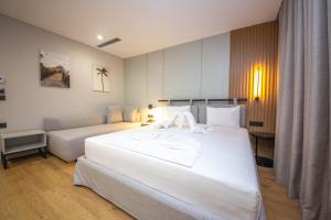 Voodi või voodid majutusasutuse Hotel Sole Mare toas