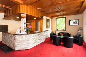 Televisyen dan/atau pusat hiburan di Hotel Waldesruh
