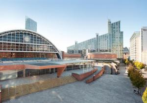 a view of a building in a city with tall buildings at The Executive Suite - By Parydise Properties - Business or Leisure stays - Sleeps 2 - Deansgate, Manchester in Manchester