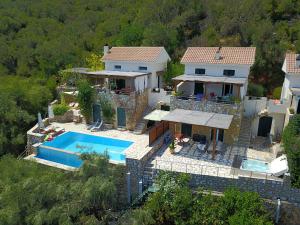 an aerial view of a house with a swimming pool at villa Séléné in Sivota