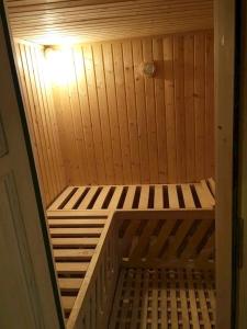a small sauna with a light inside of it at Chata Matej in Námestovo