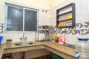 Kuchyň nebo kuchyňský kout v ubytování Mulaqat Homestay