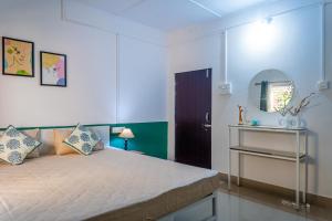 Postel nebo postele na pokoji v ubytování Mulaqat Homestay