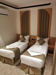 Krevet ili kreveti u jedinici u objektu فندق سما المقام