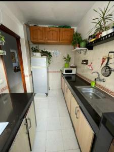 Appartement calme et confort partagée tesisinde mutfak veya mini mutfak