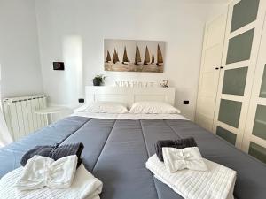Postel nebo postele na pokoji v ubytování Nui Prestige Home