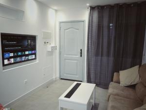 Et tv og/eller underholdning på Apartamento La Paz