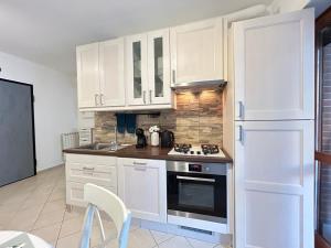 Kuchyň nebo kuchyňský kout v ubytování Nui Prestige Home