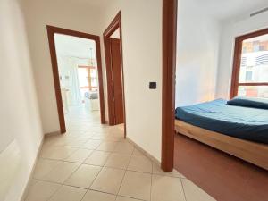 Postel nebo postele na pokoji v ubytování Nui Prestige Home