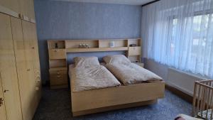 Giường trong phòng chung tại Ferienhaus LIANE