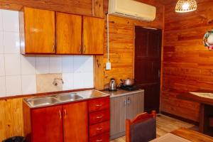 Dapur atau dapur kecil di Cabin Renty Beach