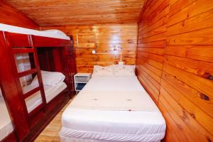 Postel nebo postele na pokoji v ubytování Cabin Renty Beach