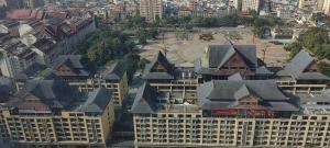 Nespecifikovaný výhled na destinaci Jinghong nebo výhled na město při pohledu z aparthotelu