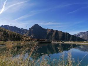 a view of a lake with mountains in the background at Apartment Eberharter in Mayrhofen