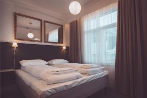 Postel nebo postele na pokoji v ubytování Villa Havblikk Tromsø