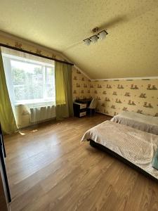 Letto o letti in una camera di Комнаты у Айрин